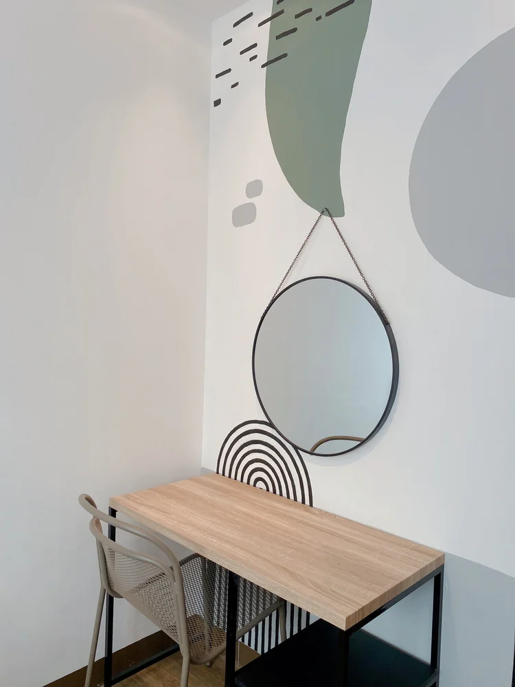 Positano: A dressing table with round mirror, every bedroom has its own.