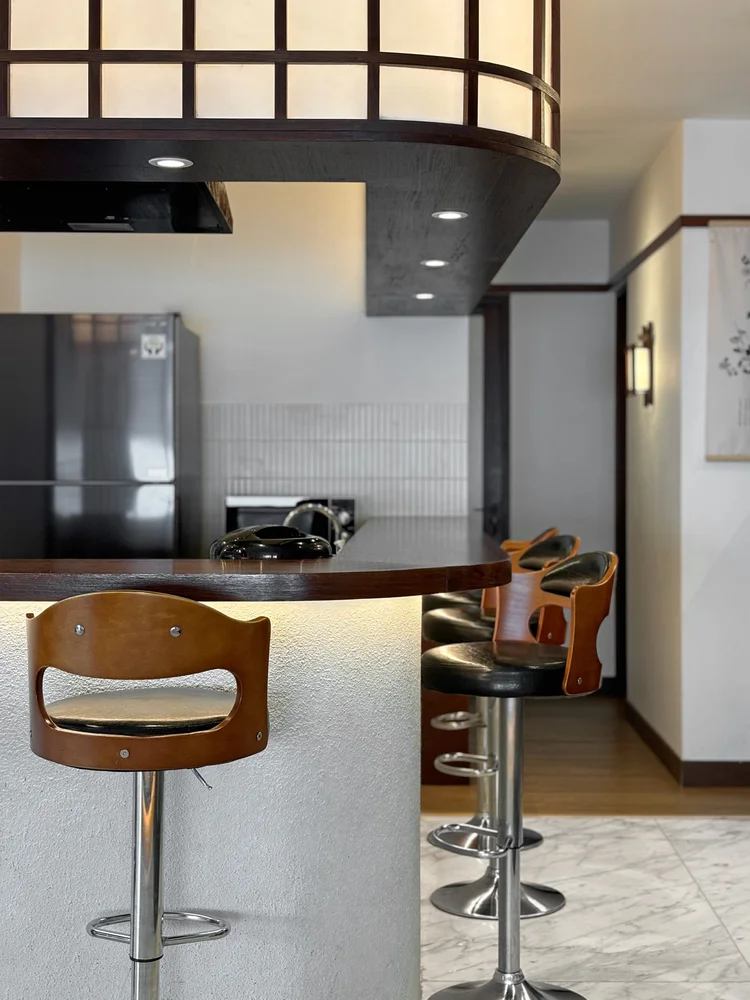 Okinawa: A stove and cooker hood are at this kitchen spot, ready to cook your own meals.