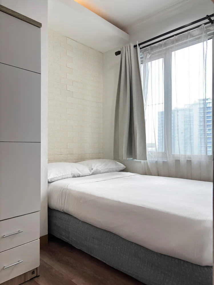 Bern: A wardrobe beside the bed, so nobody lives out of a suitcase.