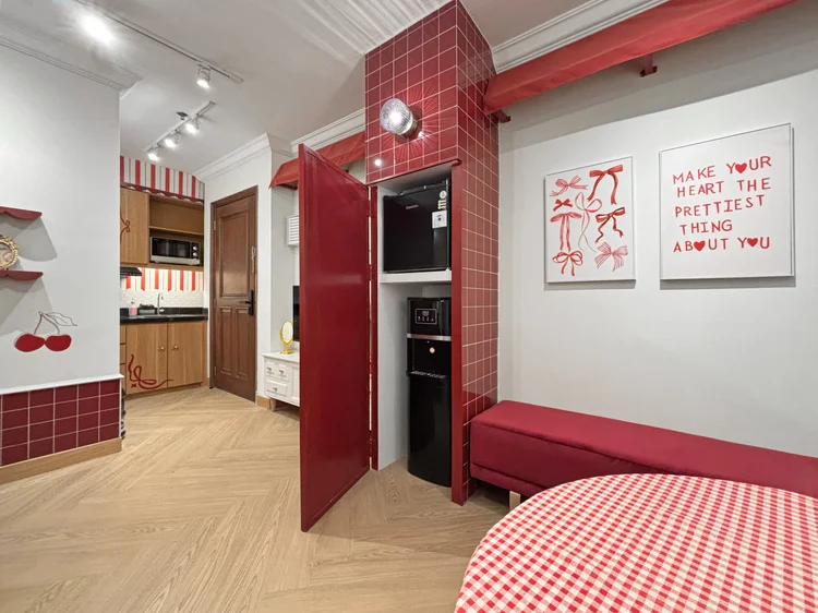 Chamonix: The red-tiled hallway connects the bedroom and kitchen.