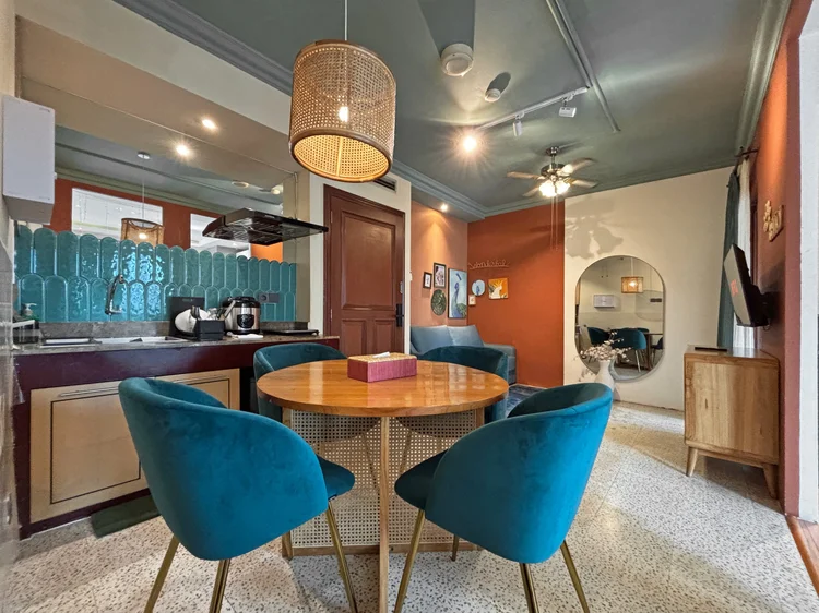 Madagascar: A dining table for four, right beside the open kitchen.