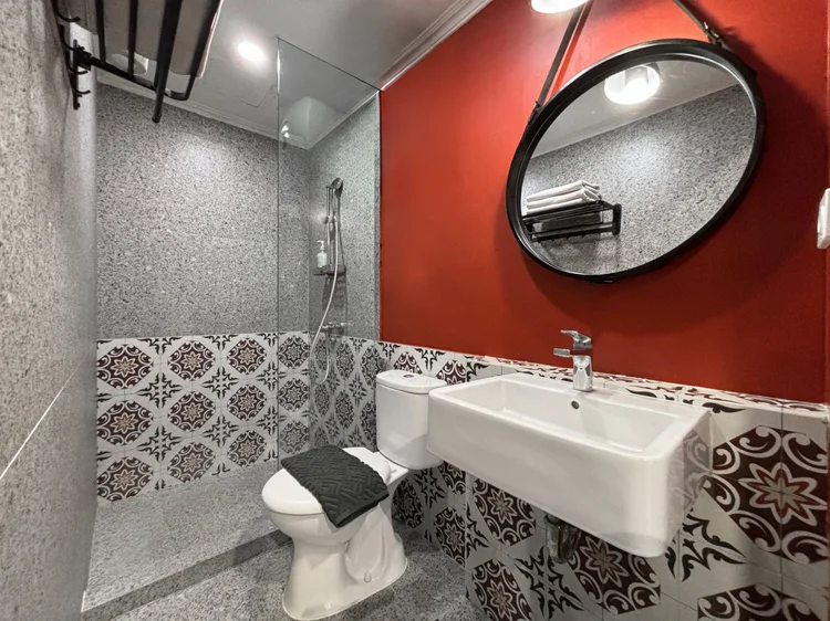 London: A bathroom with a shower and hot water, ready any time.