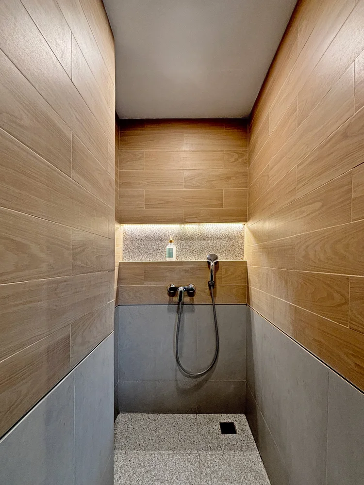 Okinawa: A bathroom with a shower and hot water, ready any time.