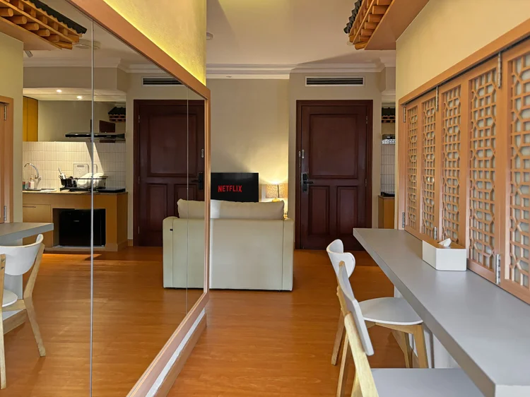 Nami: A full-length mirror on the wall, making the room feel bigger.