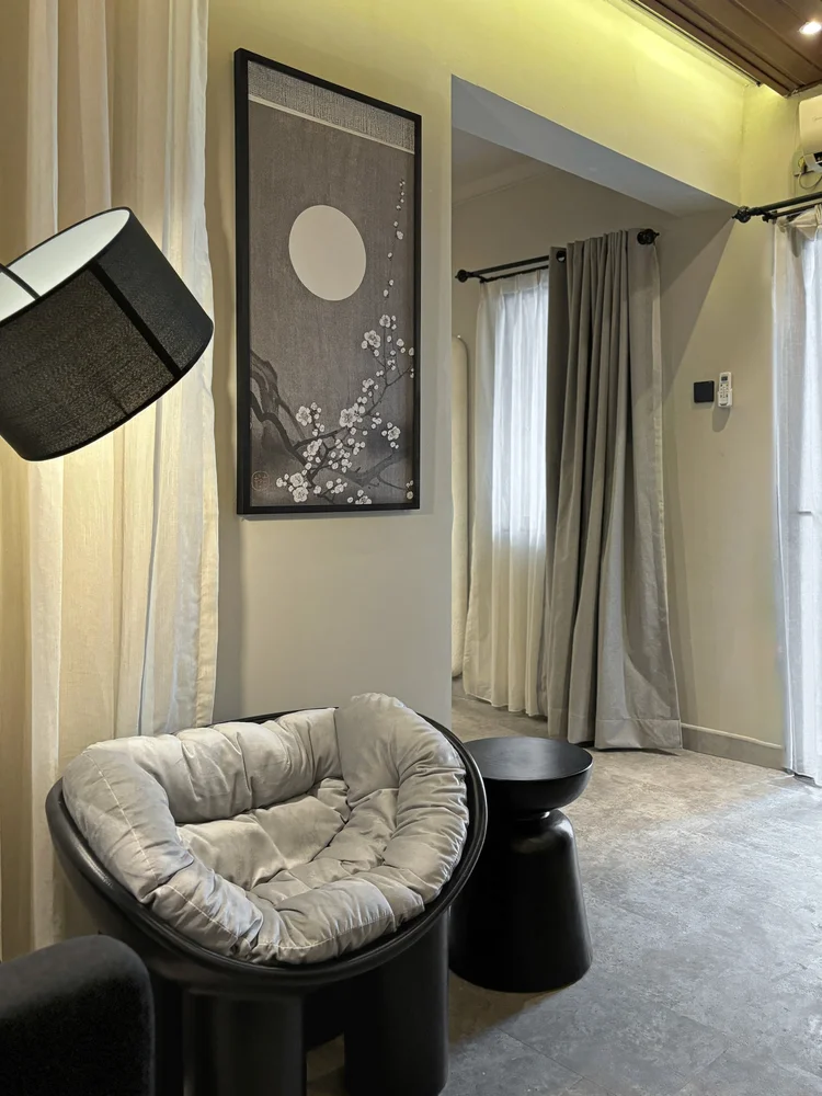 Saitama: A lounge chair by the window, for reading or a call without disturbing the others.