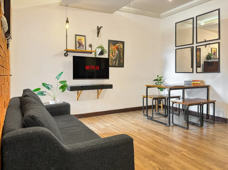 Brooklyn: Living and dining in one room, with a ceiling fan.